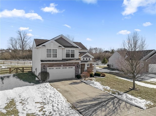 view of front of property with a garage