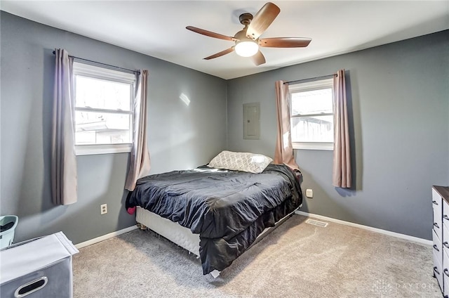 carpeted bedroom featuring ceiling fan