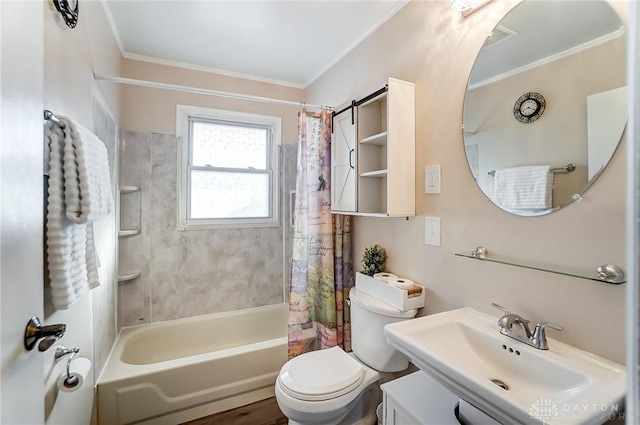 full bathroom featuring crown molding, toilet, sink, and shower / bath combo with shower curtain