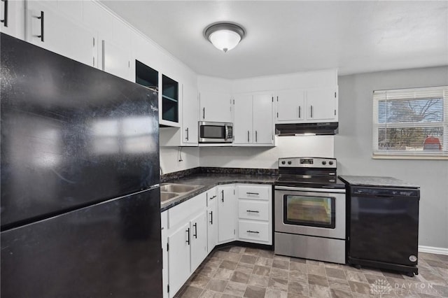 kitchen featuring white cabinetry, sink, and black appliances