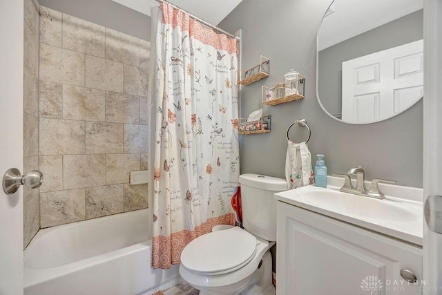 full bathroom with vanity, toilet, and shower / tub combo