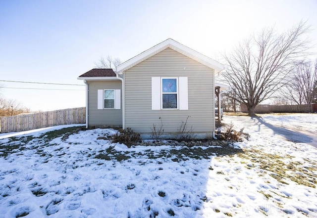 view of snow covered property