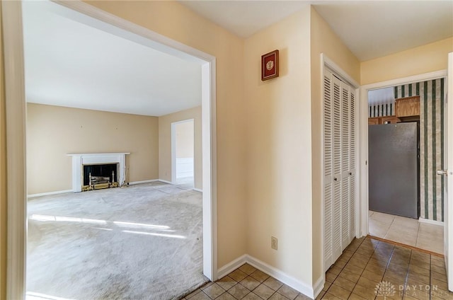 corridor featuring carpet floors