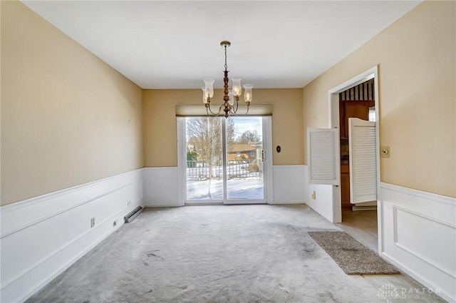 unfurnished dining area with light colored carpet and a notable chandelier