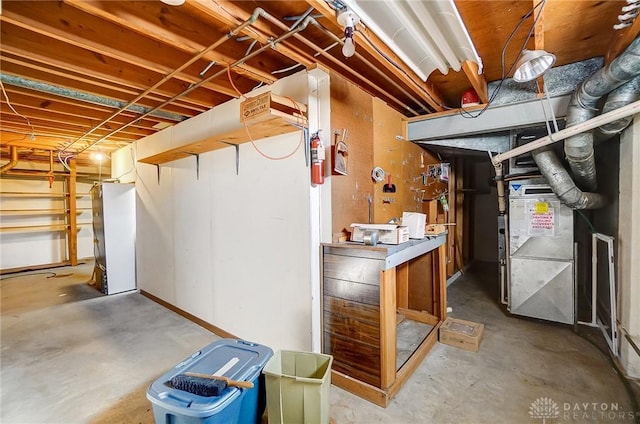 basement featuring heating unit