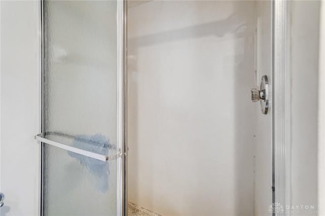 bathroom with an enclosed shower