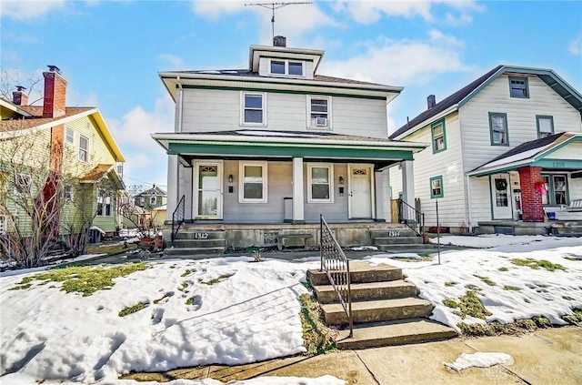 view of property with covered porch