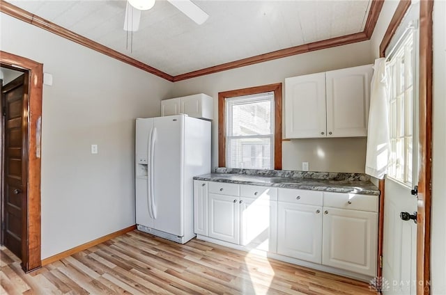 kitchen with white cabinetry, ornamental molding, light hardwood / wood-style flooring, and white fridge with ice dispenser