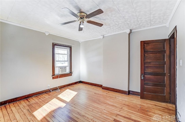 spare room with crown molding, ceiling fan, light hardwood / wood-style flooring, and cooling unit