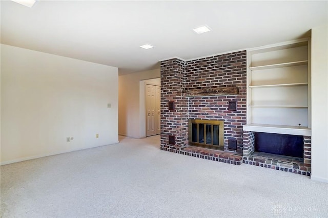 unfurnished living room with a fireplace and light colored carpet