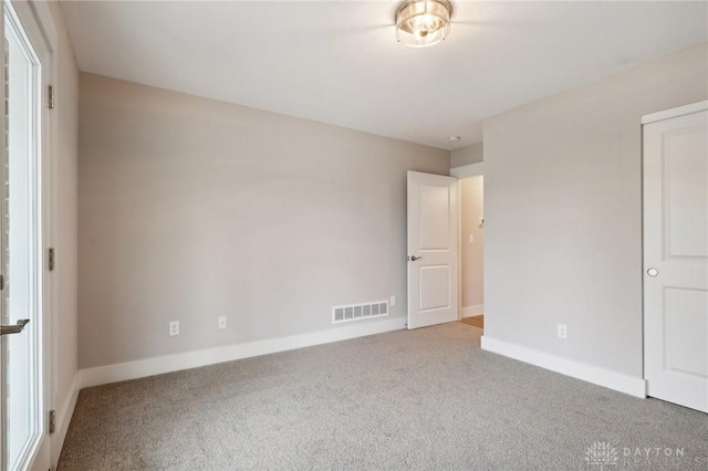 view of carpeted spare room