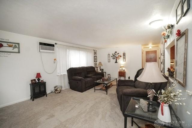 living room with a wall mounted air conditioner and carpet floors