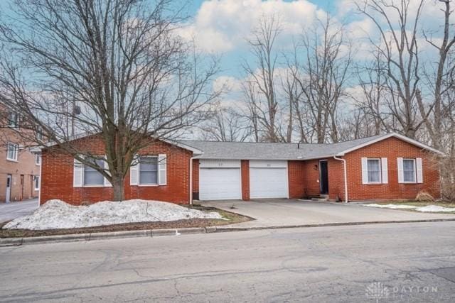 single story home with a garage