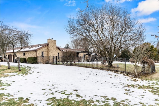 view of snow covered property