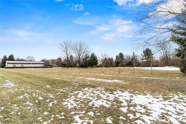 view of yard with a rural view