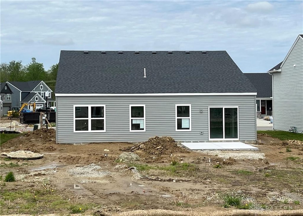 1268 Timber Glen Dr, Wilmington, OH 45177 - rear view of house with roof with shingles and a patio area