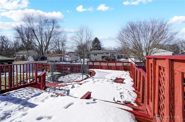 view of snow covered deck