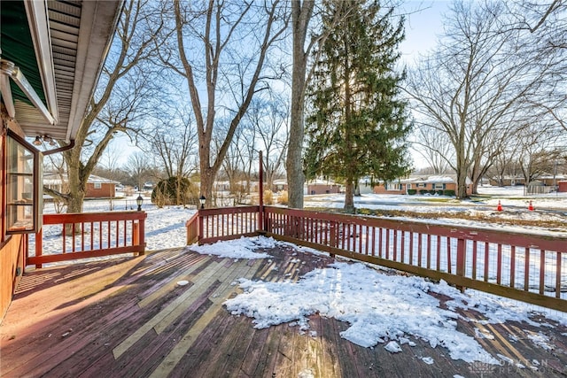 view of snow covered deck