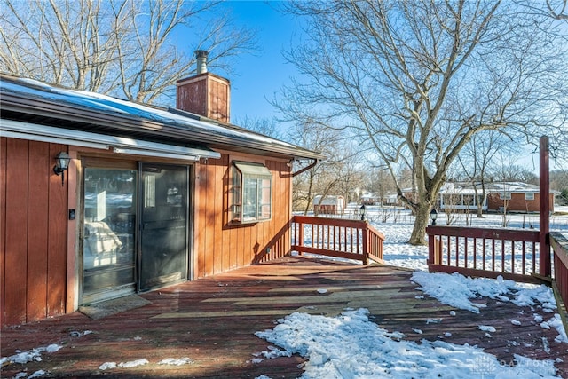 view of snow covered deck