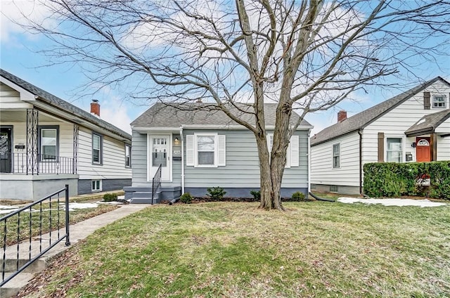 bungalow with a front yard