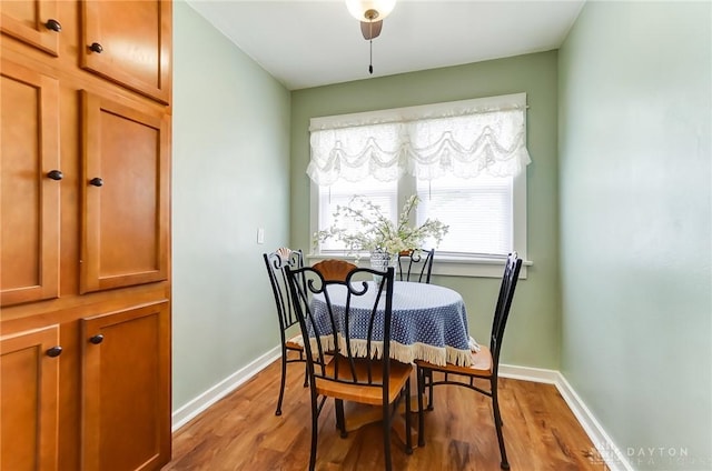 dining area with light wood-type flooring