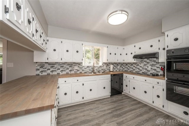 kitchen featuring sink, tasteful backsplash, black appliances, white cabinets, and wood counters