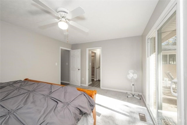 carpeted bedroom with ceiling fan and connected bathroom