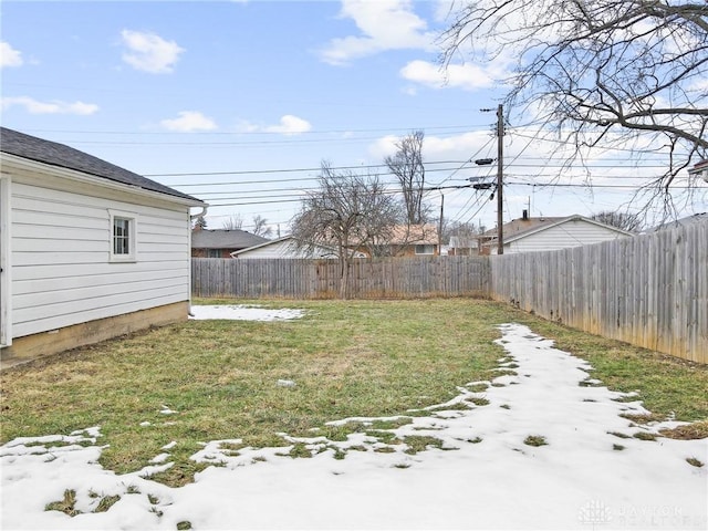 view of yard covered in snow