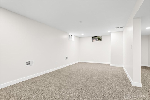 basement with carpet flooring