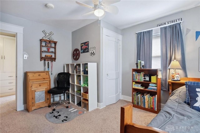 carpeted bedroom with ceiling fan