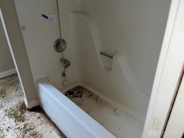 bathroom with a tub to relax in