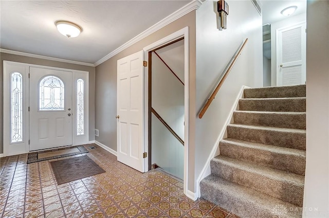 entryway featuring ornamental molding