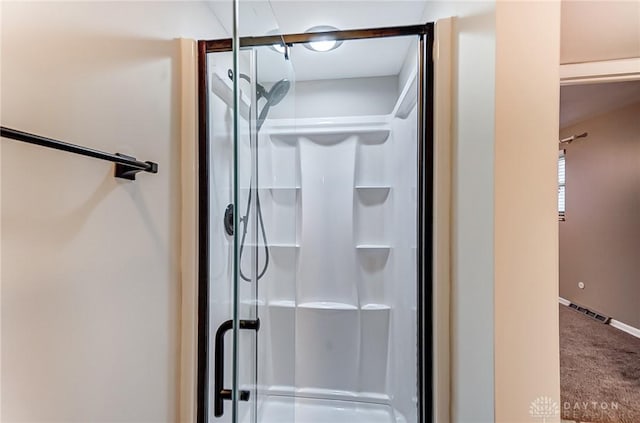 bathroom featuring walk in shower