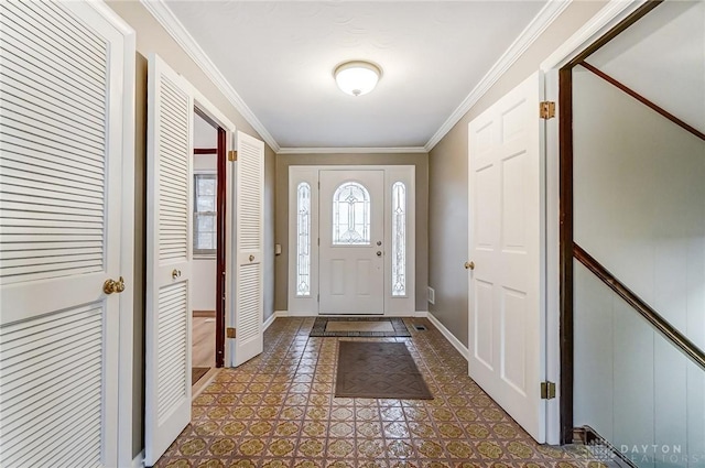 entrance foyer featuring ornamental molding