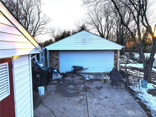 view of snow covered garage