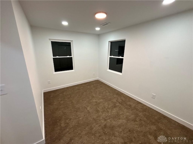 view of carpeted spare room