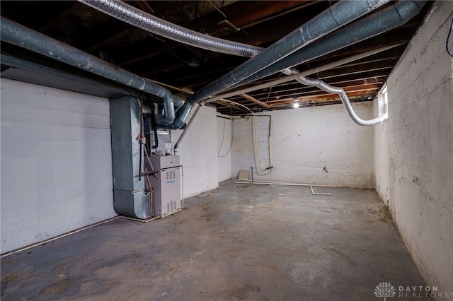 basement featuring heating unit