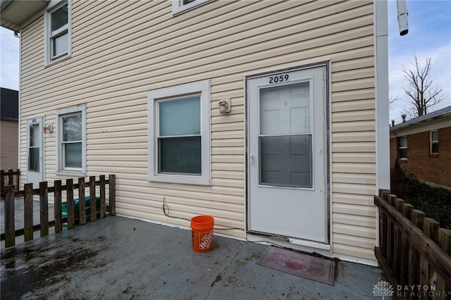 doorway to property featuring a patio