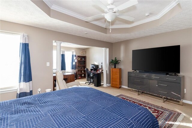 bedroom with ornate columns, a raised ceiling, light carpet, and crown molding