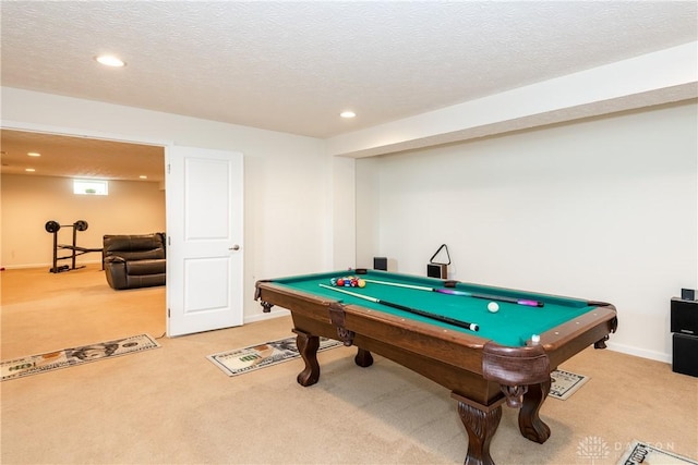 rec room featuring carpet floors, billiards, and a textured ceiling