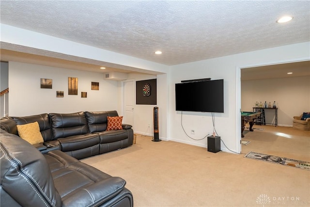 living room featuring light carpet and a textured ceiling