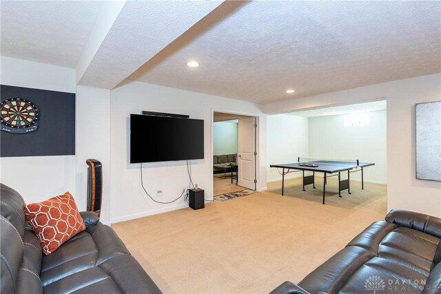 carpeted living room with a textured ceiling