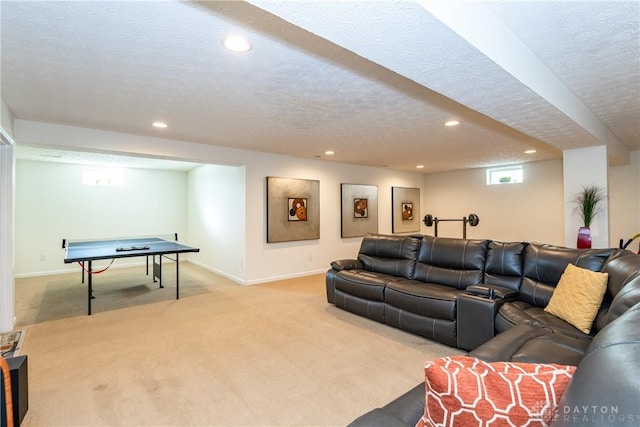 living room with light carpet and a textured ceiling