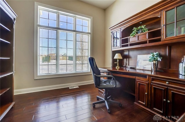 office space with dark hardwood / wood-style floors