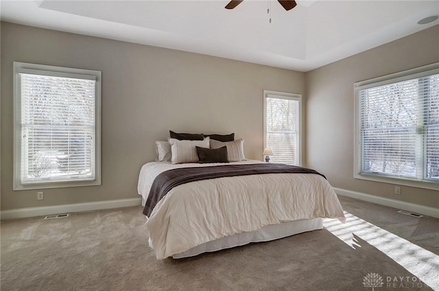 bedroom with ceiling fan and carpet