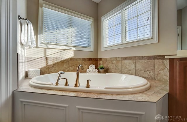 bathroom featuring a bath