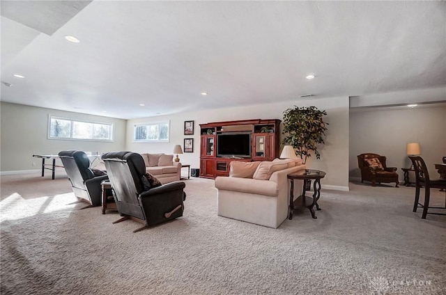 living room with light colored carpet