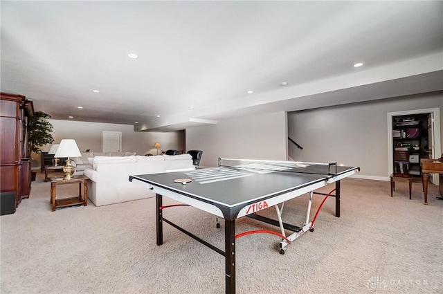 game room with light colored carpet