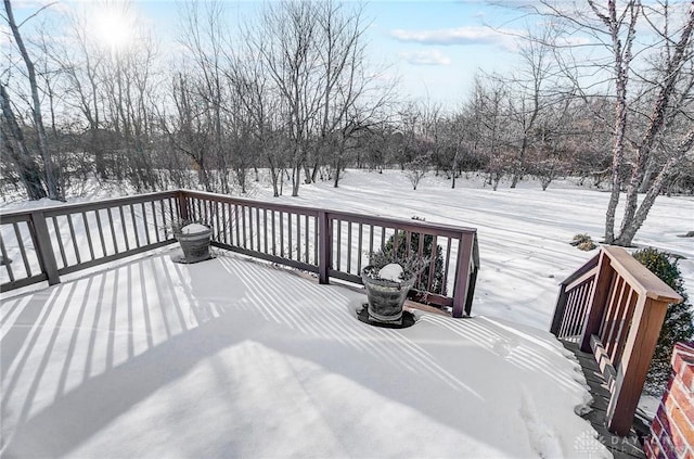 view of snow covered deck