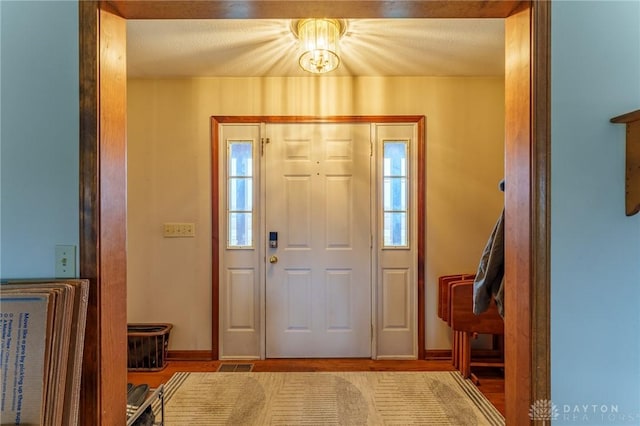 entrance foyer featuring light wood-type flooring